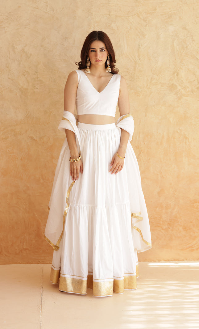 White sleeveless lehenga set