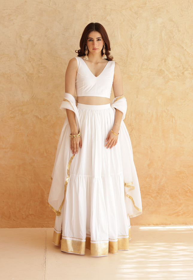 White sleeveless lehenga set