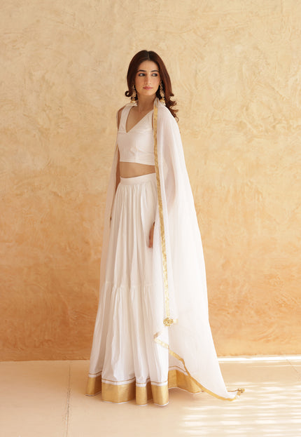 White sleeveless lehenga set