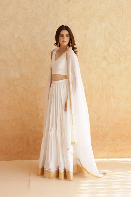 White sleeveless lehenga set