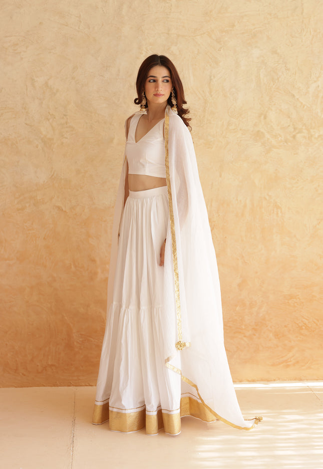 White sleeveless lehenga set