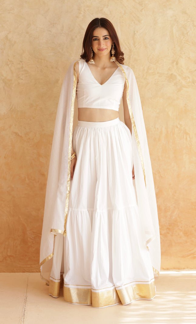 White sleeveless lehenga set