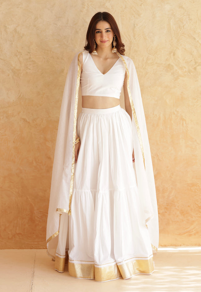 White sleeveless lehenga set