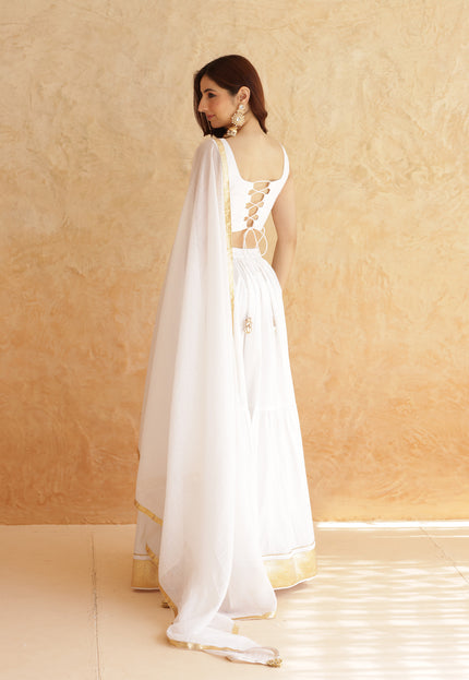 White sleeveless lehenga set