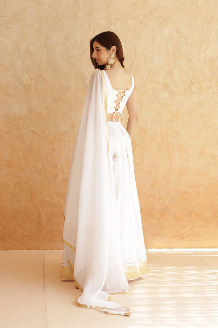 White sleeveless lehenga set