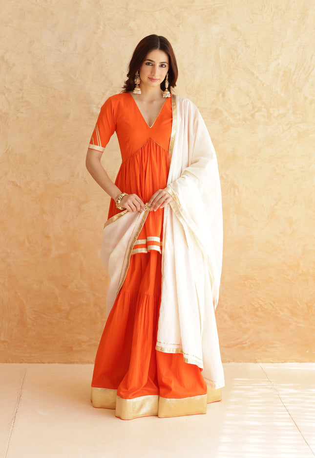 Bright orange lehenga + kurti set