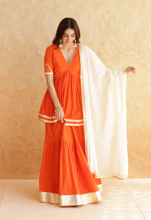 Bright orange lehenga + kurti set