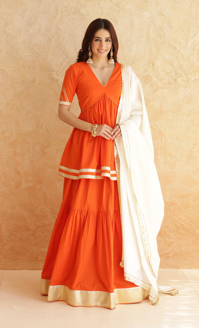 Bright orange lehenga + kurti set
