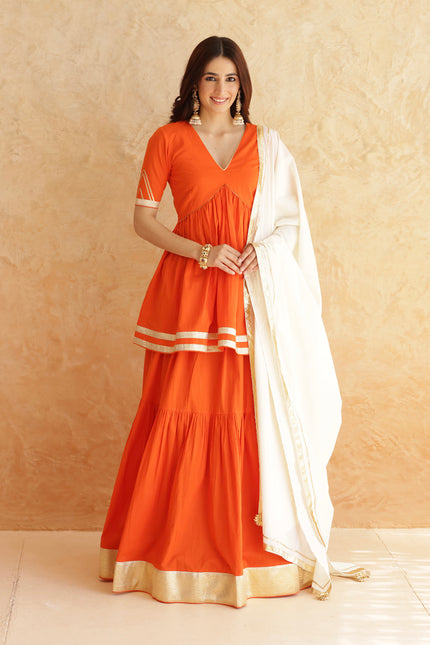 Bright orange lehenga + kurti set