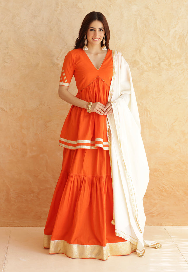 Bright orange lehenga + kurti set
