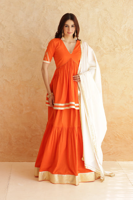 Bright orange lehenga + kurti set