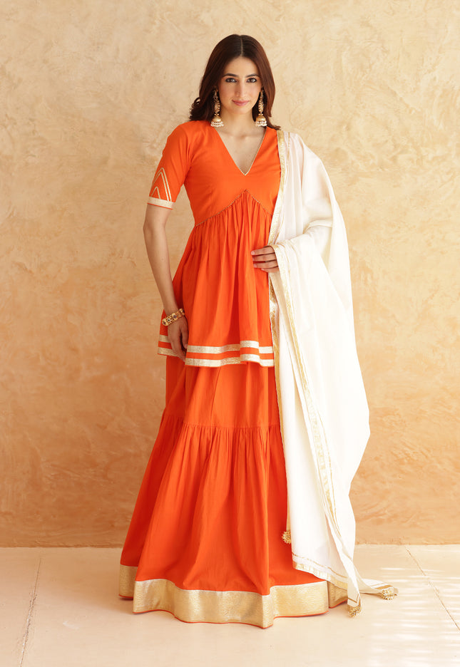 Bright orange lehenga + kurti set