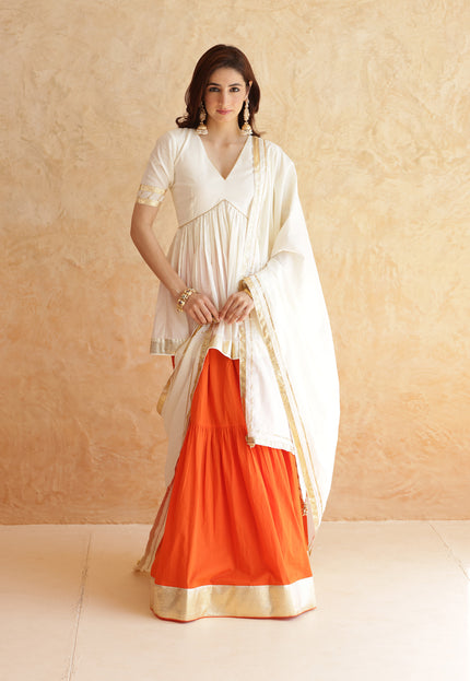 Bright orange lehenga + kurti set