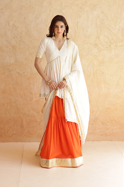 Bright orange lehenga + kurti set