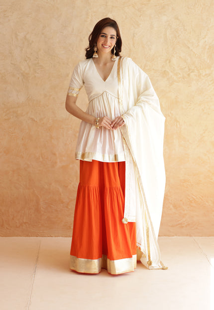 Bright orange lehenga + kurti set