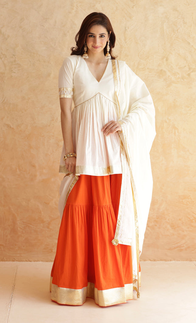 Bright orange lehenga + kurti set