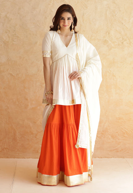 Bright orange lehenga + kurti set