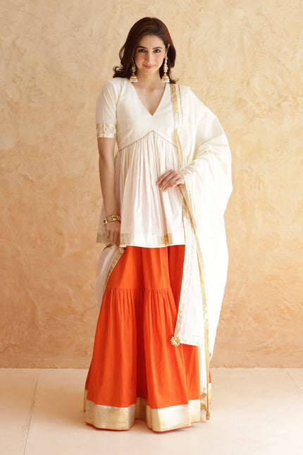 Bright orange lehenga + kurti set