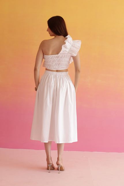 White frilled top