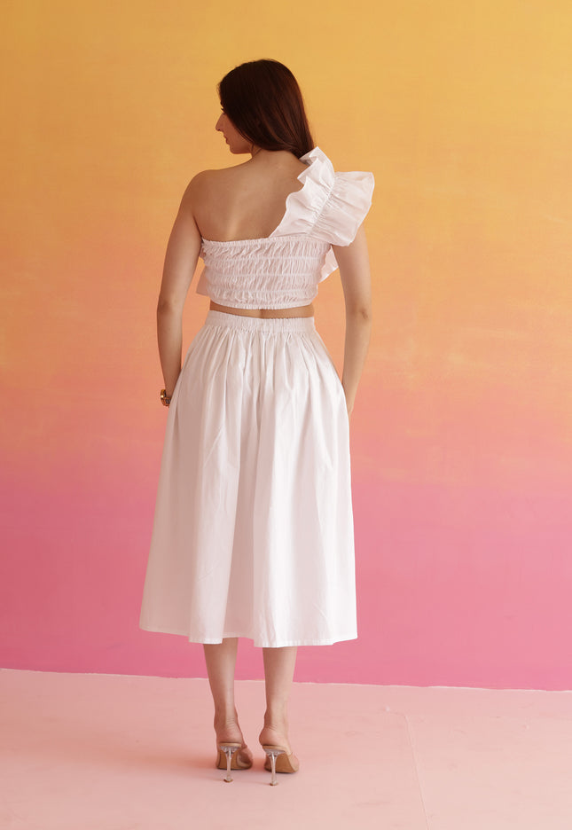 White frilled top