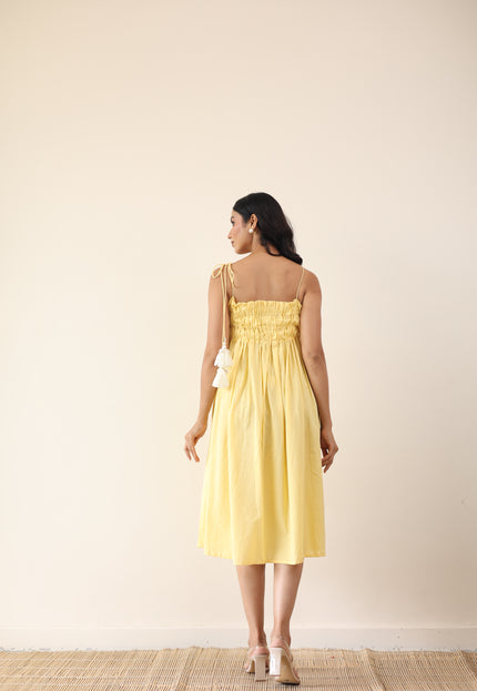 Yellow gathered midi dress