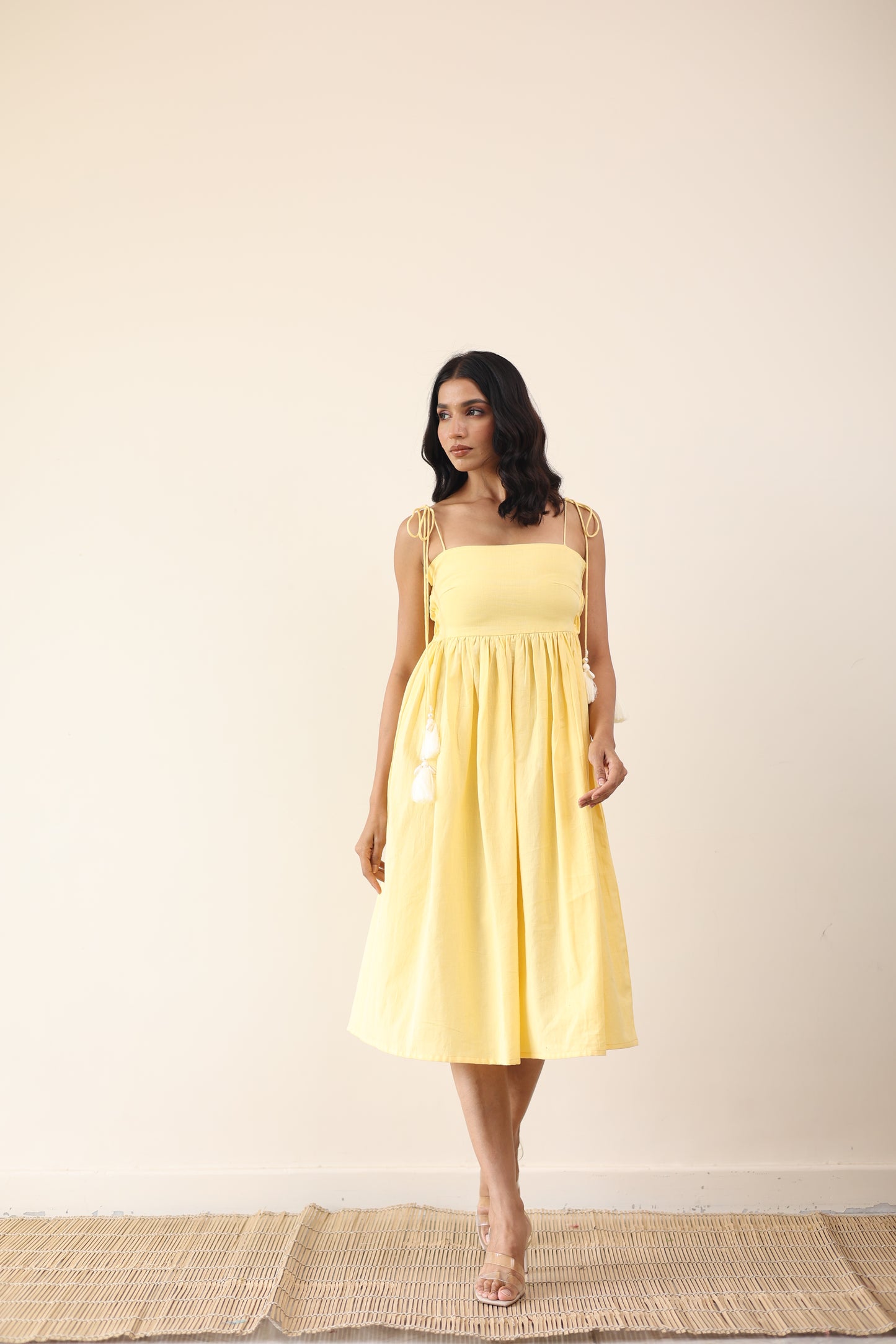 Yellow gathered midi dress