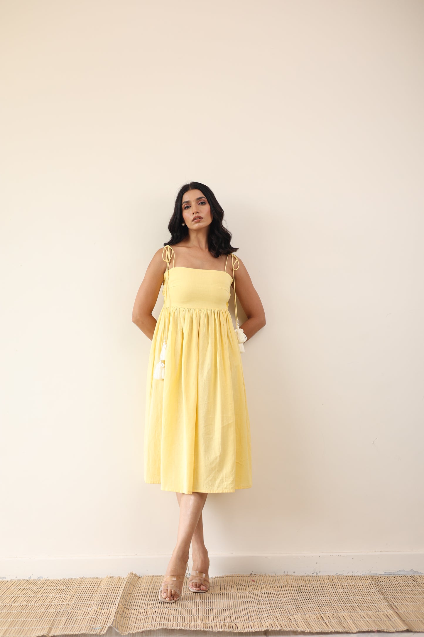 Yellow gathered midi dress