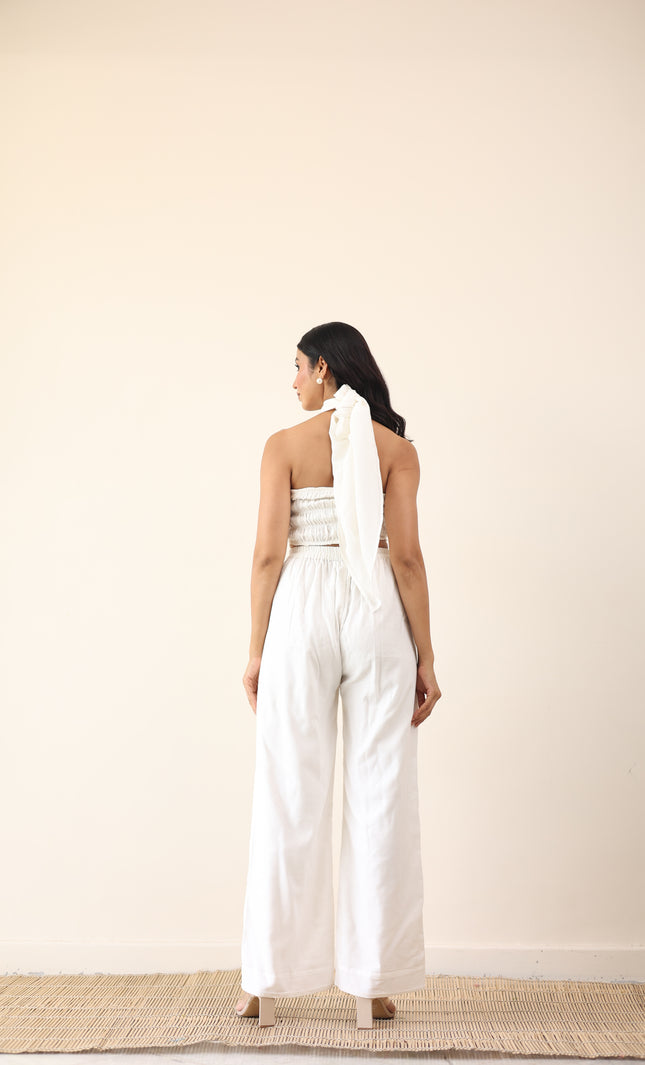 White high waist pants with tie up halter neck top