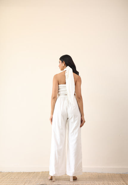 White high waist pants with tie up halter neck top