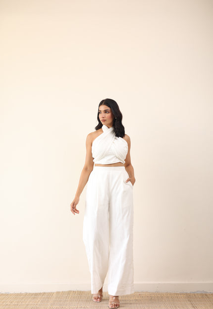 White high waist pants with tie up halter neck top