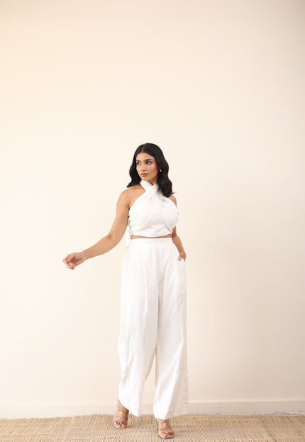 White high waist pants with tie up halter neck top