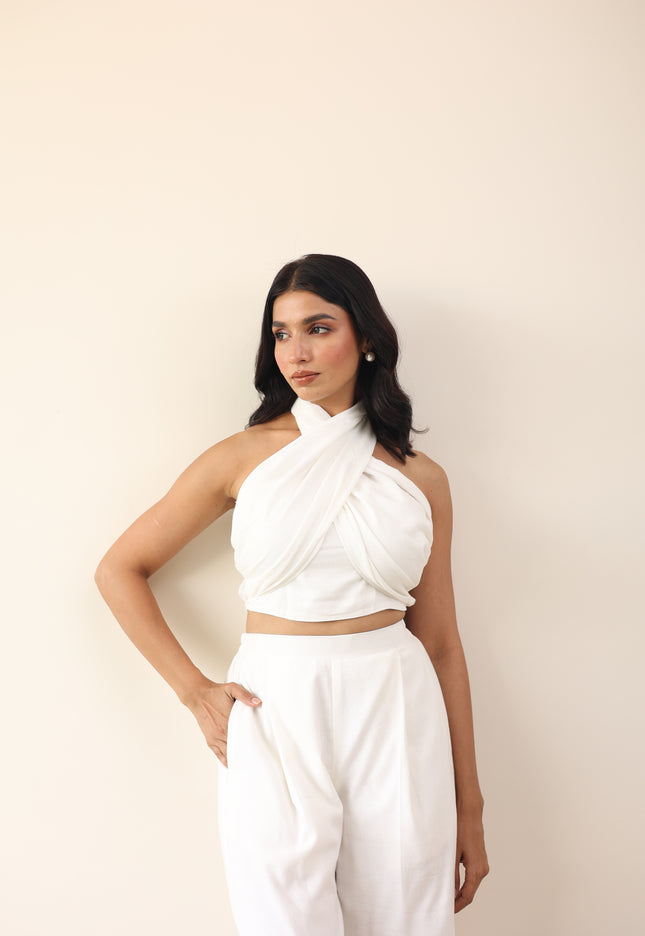 White high waist pants with tie up halter neck top