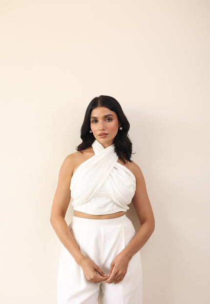 White high waist pants with tie up halter neck top