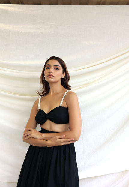 Black co-ord skirt and pearl bandeau top