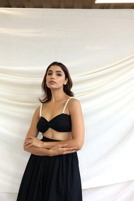 Black co-ord skirt and pearl bandeau top