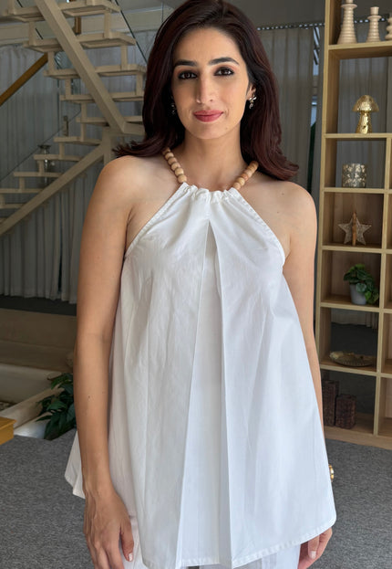 White wooden bead top