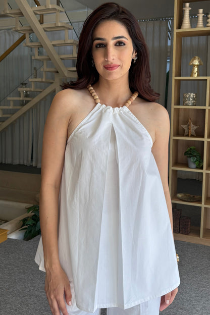 White wooden bead top