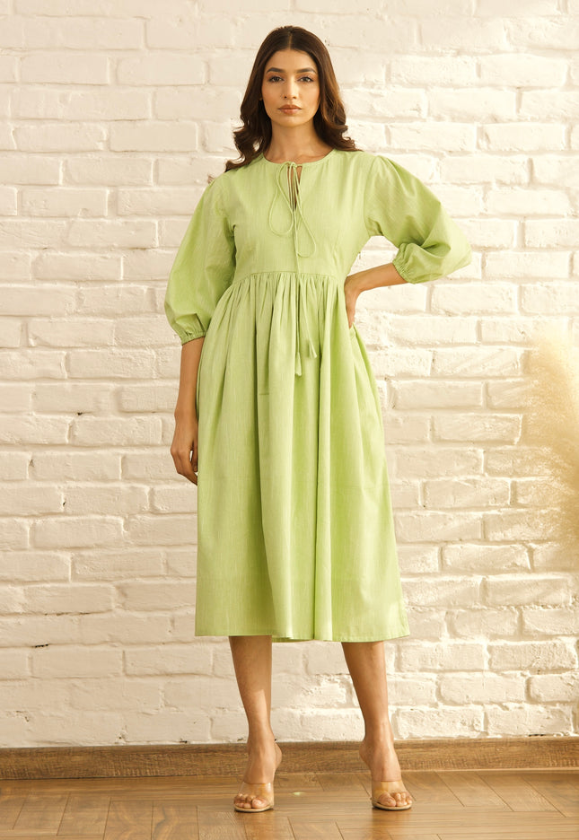 Green gathered midi dress