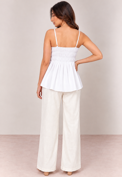 White peplum top