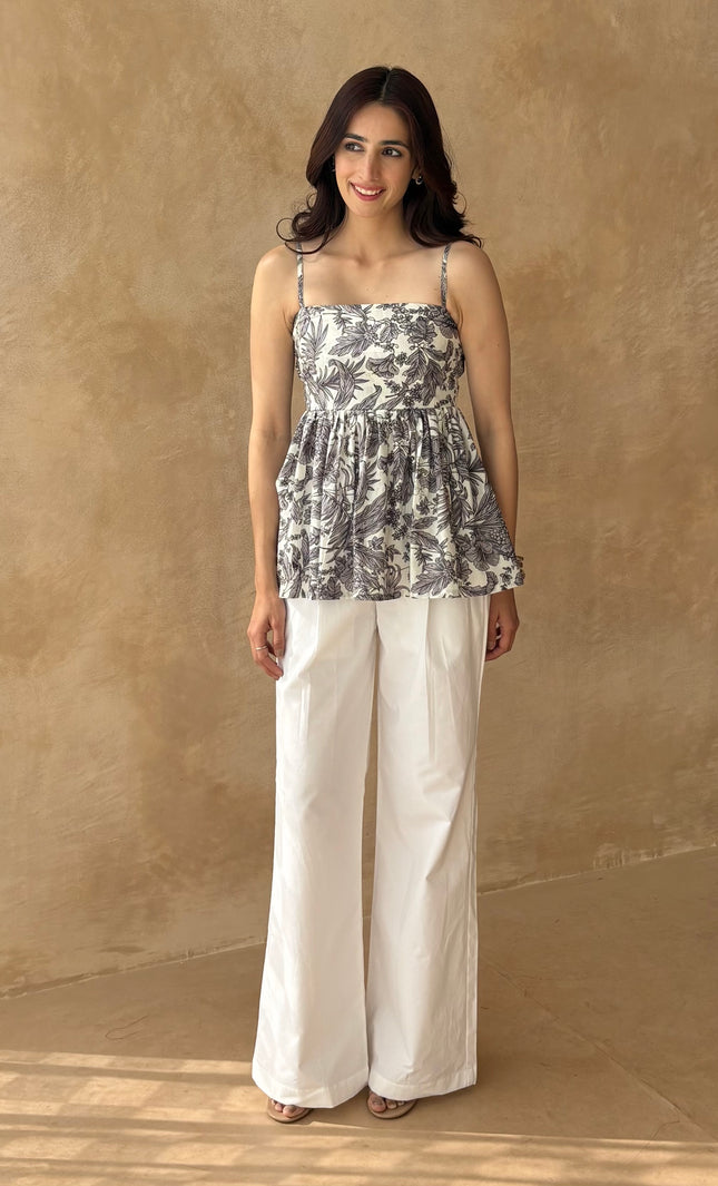 White pants + printed peplum top