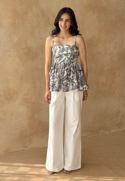 White pants + printed peplum top