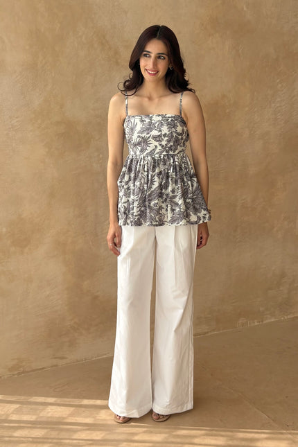White pants + printed peplum top