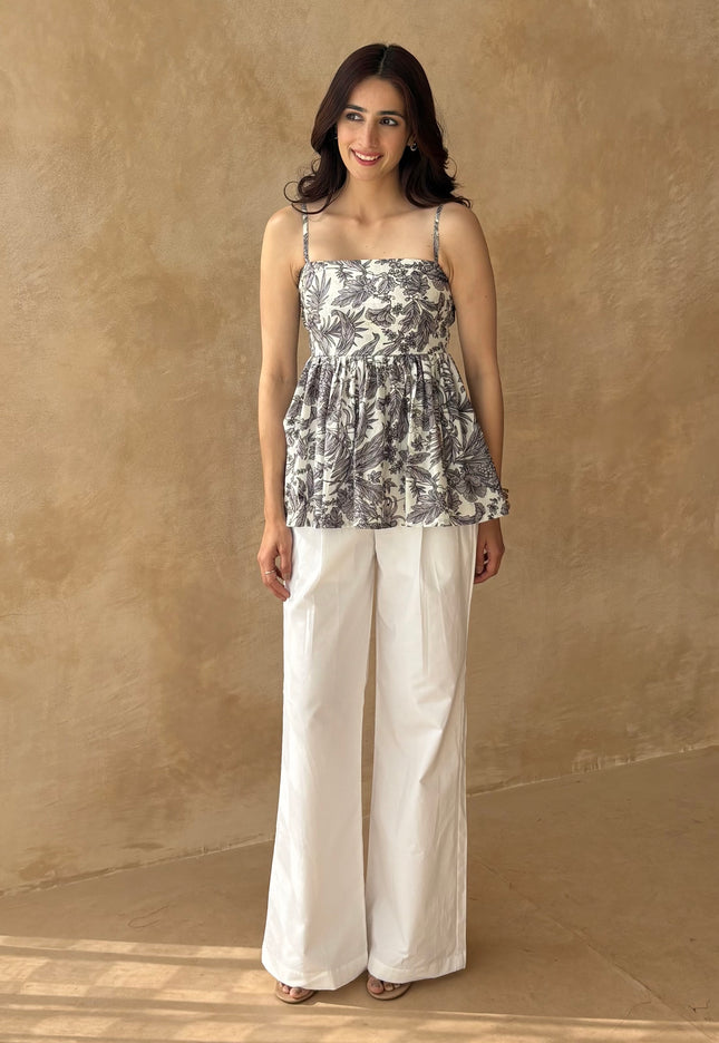 White pants + printed peplum top