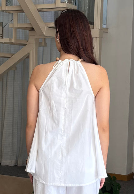White wooden bead top