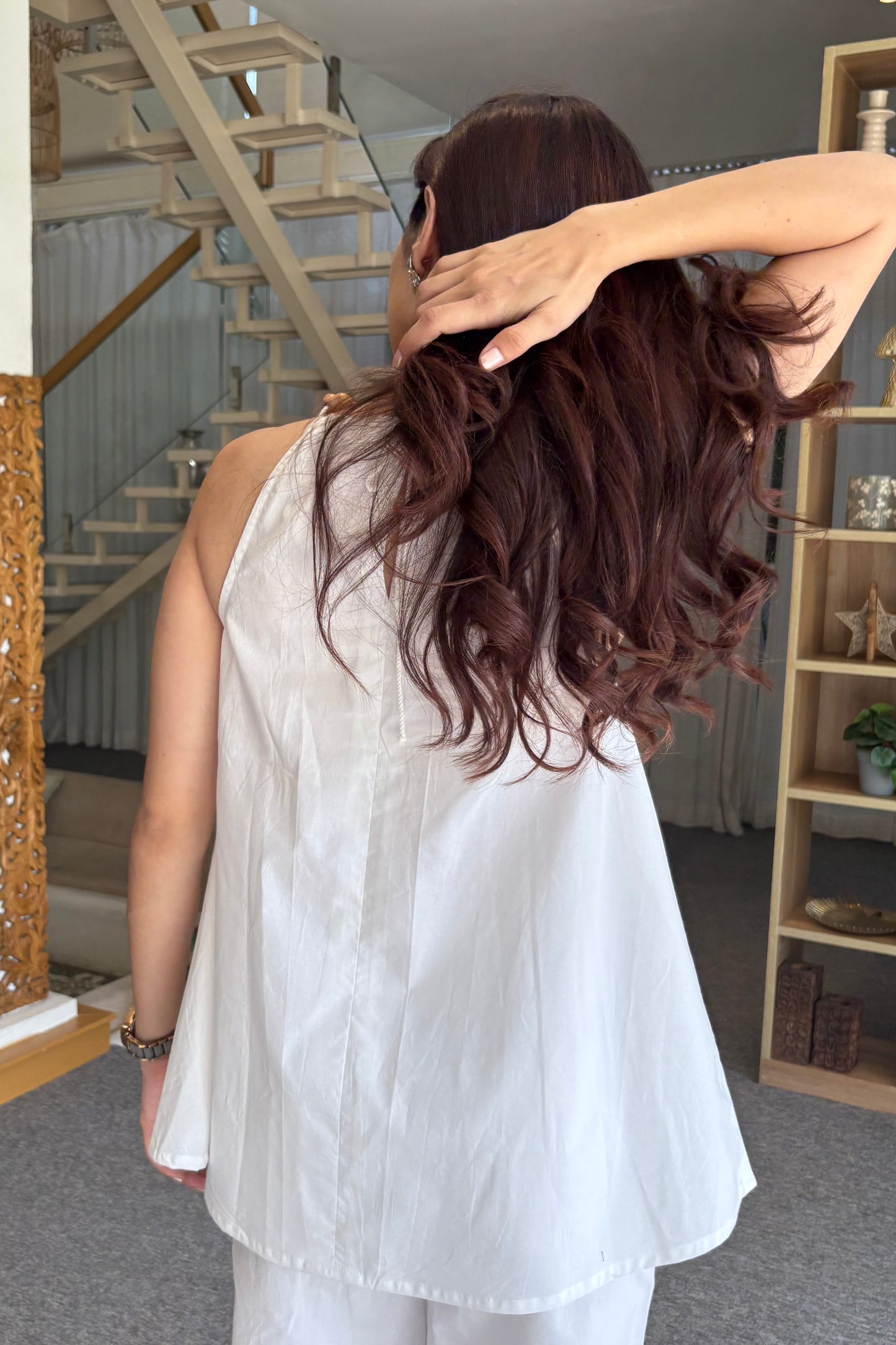 White wooden bead top