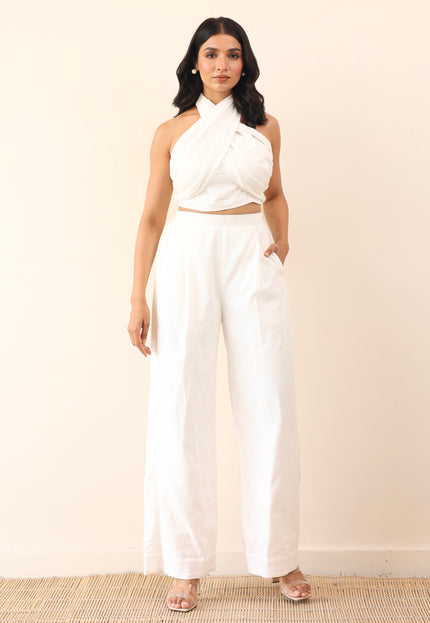 White high waist pants with tie up halter neck top