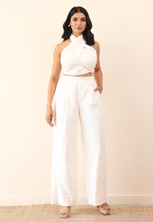 White high waist pants with tie up halter neck top