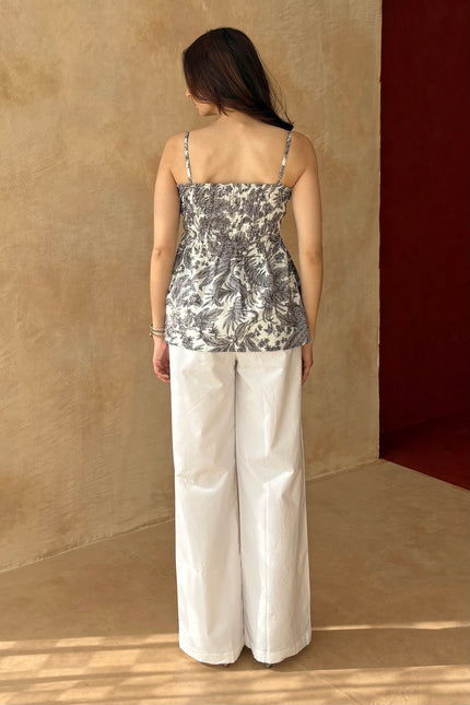 White pants + printed peplum top